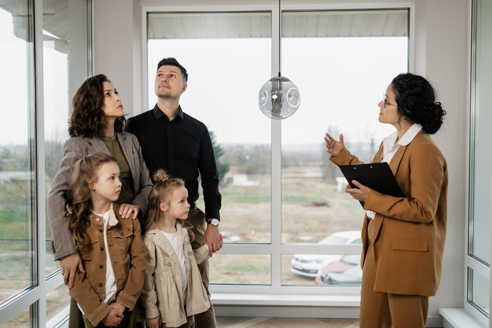 Family on a home tour with a real estate agent