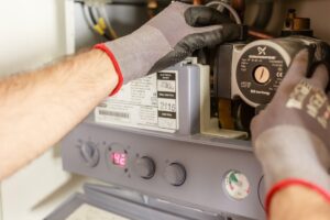 Free Plumber Repairing Power Source Stock Photo